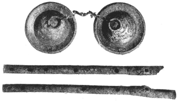  Cymbals (about 4 in.) and double flute. (British Museum.)